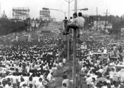 During the height of the revolution, an estimated one to three million people filled EDSA from Ortigas Avenue all the way to Cubao. The photo above shows the area at the intersection of EDSA and Boni Serrano Avenue, just between Camp Crame and Camp Aguinaldo.
