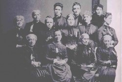 First International Convention of Women in Washington D.C. Susan B. Anthony is third from the left, front row.